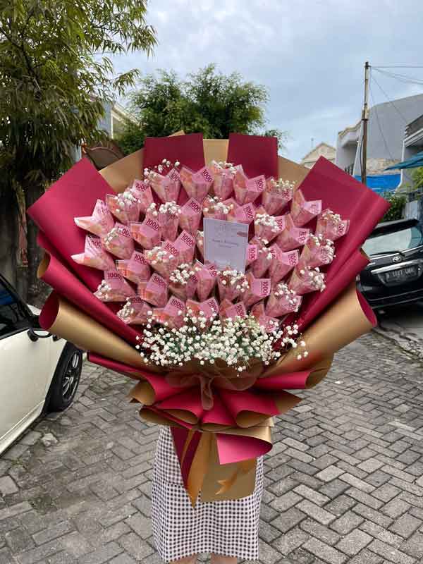 تزیین پول برای کادو دادن به شکل دسته گل