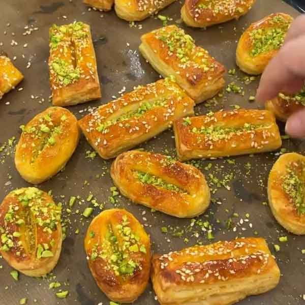 علت پف نکردن شیرینی زبان رومال شیرینی زبان شربت شیرینی زبان شیرینی زبان با خمیر جادویی طرز تهیه شیرینی زبان با خمیر هزارلا علت کج شدن شیرینی زبان طرز تهیه شیرینی زبان در قنادی
