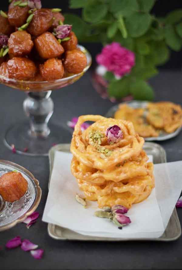 فوت و فن بامیه ترد برای ترد شدن زولبیا طرز تهیه زولبیا با جوش شیرین نحوه ریختن زولبیا در ماهیتابه طرز تهیه زولبیا حرفه ای طرز تهیه بامیه زولبیا در خانه برمیگردیم طرز تهیه زولبیا بامیه قنادی علت سفت شدن زولبیا