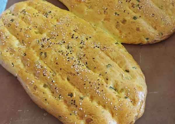 نان پیازچه کردستان نان محلی با پیازچه طرز تهیه نان سبزیجات در ماهیتابه طرز تهیه نان سبزیجات با خمیر نانوایی طرز تهیه نان پیازچه کرمانشاهی نون پیازچه طرز تهیه نان سبزیجات با سیب زمینی نان گوشت و سبزیجات
